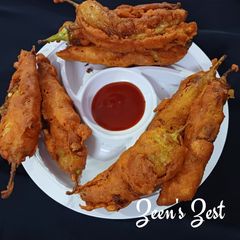 A picture of Mirch Pakoras with dry Coconut and Tamarind.