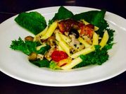 Una foto de pasta tomates cherry