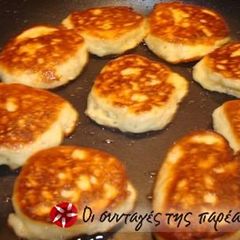 A picture of Tiganites with apples.