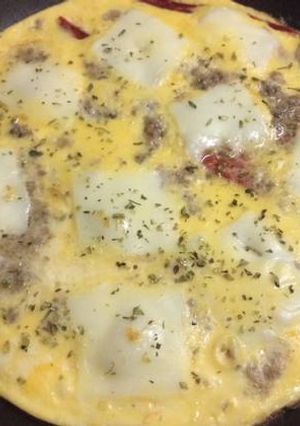 Una foto de Tortipizza de atún 🍕🐟