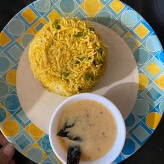 A picture of Masala Rice with Kadhi.