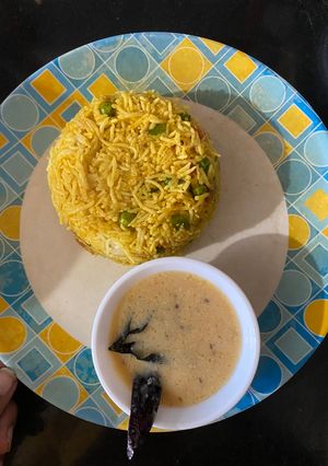 A picture of Masala Rice with Kadhi.