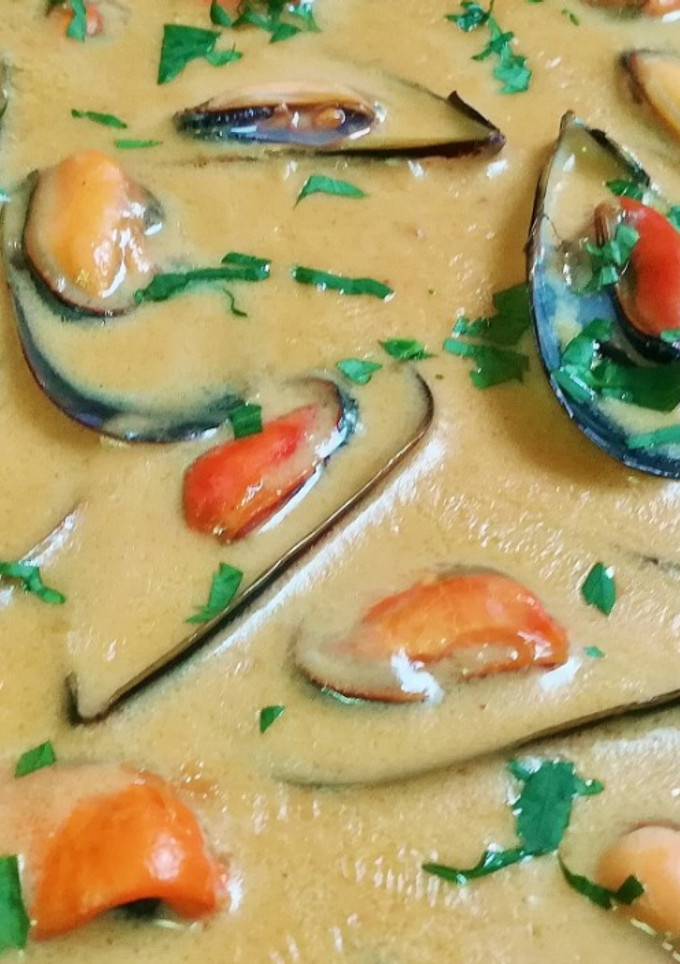 Una foto de Mejillones a la fina crema de cava