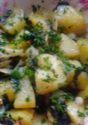 Una foto de Papas (patatas) con espinacas