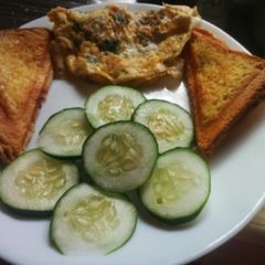 A picture of Toast bread with eggs coriander.