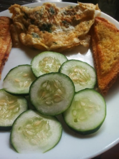 A picture of Toast bread with eggs coriander.