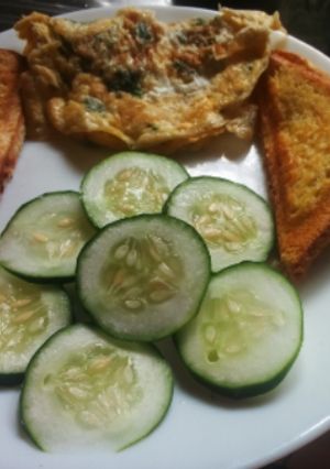 A picture of Toast bread with eggs coriander.