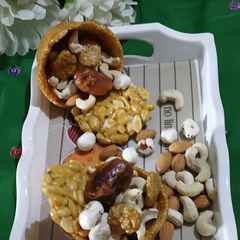 A picture of TilKi Kotori With dryfruits.