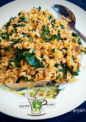 A picture of Local Jollof Rice with moringa.