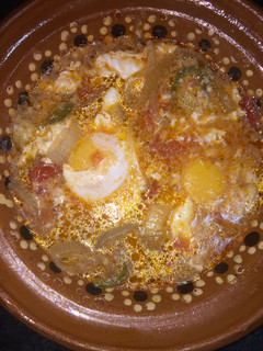 A picture of Huevos Rancheros or Drowned Eggs.
