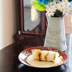 A picture of Erachi Puttu/ Steamed rice flour cake with spicy meat masala stuffing.