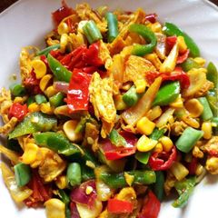 A picture of Shredded chicken and atir fried vegetables.