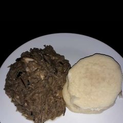 A picture of Boiled yam with ugba sauce.