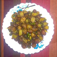 A picture of Baby potatoes-peas fry.