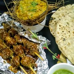 A picture of Mix lentils with Arabic recipe and saucy Mutton boti.