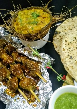 A picture of Mix lentils with Arabic recipe and saucy Mutton boti.