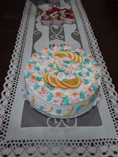 Una foto de Tarta de pera, naranja y cardamomo