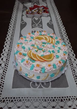 Una foto de Tarta de pera, naranja y cardamomo