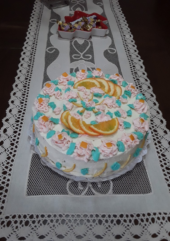 Una foto de Tarta de pera, naranja y cardamomo