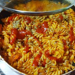 A picture of Red sauce pasta.