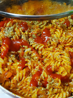 A picture of Red sauce pasta.