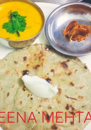 A picture of Brinjal Kadhi with bajra roti.