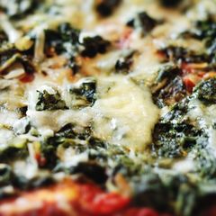 A picture of Whole wheat spinach pizza.