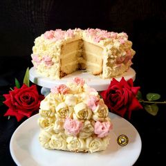 Vanilla Sponge Cake With Buttercream Frosting A picture of Vanilla Sponge Cake With Buttercream Frosting.