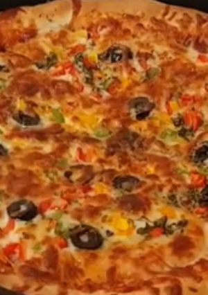 صورة لوصفة بيتزا على الطريقة الايطالية الاصلية 😋