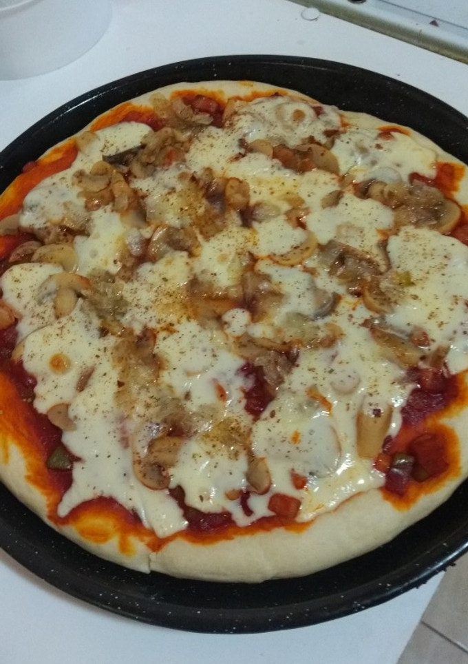 Una foto de Pizza de champiñones