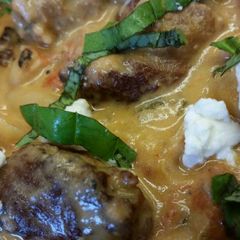 A picture of Sausage w/ Goat Cheese Sauce.