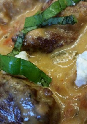 A picture of Sausage w/ Goat Cheese Sauce.
