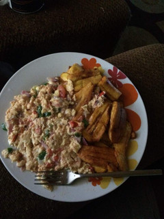A picture of Fried plantain with fried eggs.