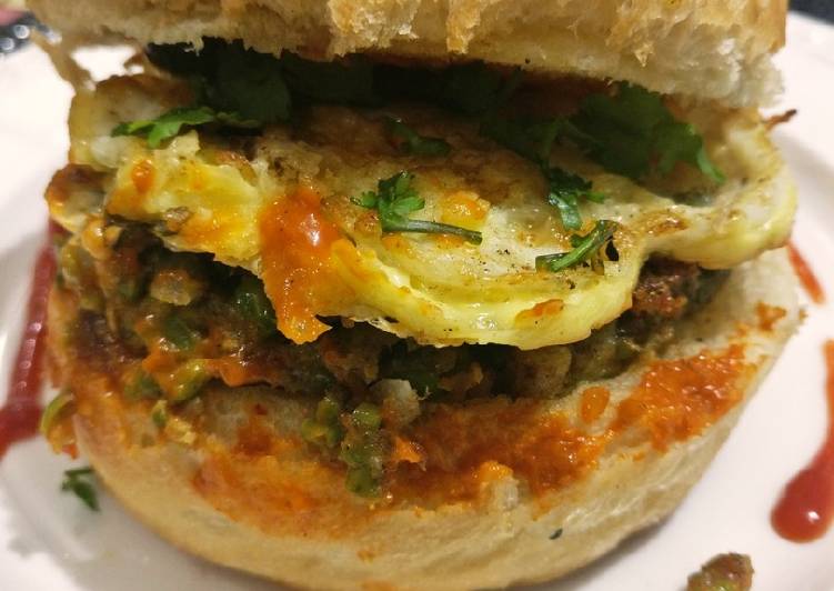 Cheese, egg, veggies stuffed burger
