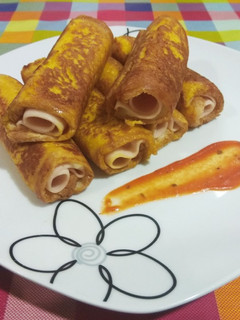 Una foto de Rollitos york-queso
