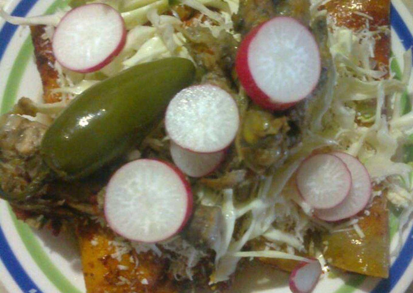 Enchiladas rojas con pollo en asado