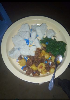 A picture of Ugali, sukuma and beef.