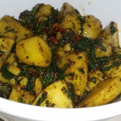 A picture of Spinach Potato fry.