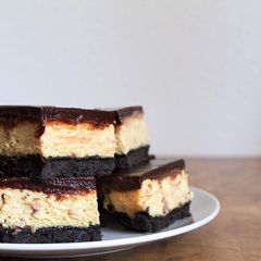 A picture of Oreo, chocolate and peanut butter cheesecake bars.