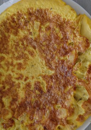 Une photo de Tortilla pomme de terre oignons