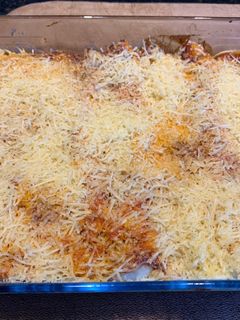 Una foto de Canelones de espinaca, ricota y muzzarella con salsa de tomatePara una comida y luego para FRIZAR