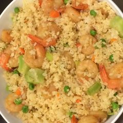 A picture of Shrimp fried Rice with vegetable.