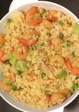 A picture of Shrimp fried Rice with vegetable.