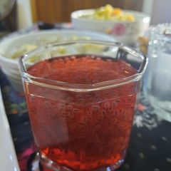 A picture of Jam e shirin with basil.