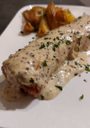Une photo de Andouillette grillée sauce moutarde