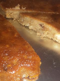 Una foto de Budín de pan con dulce de leche y chocolate