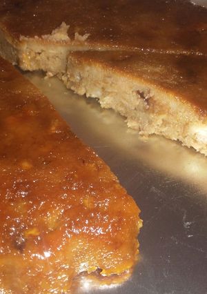 Una foto de Budín de pan con dulce de leche y chocolate