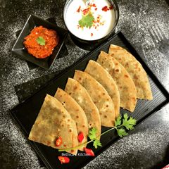 A picture of Stuffed Palak Paneer Paratha.