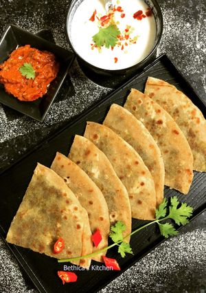 A picture of Stuffed Palak Paneer Paratha.