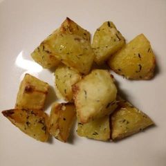 Thyme and Parmesan roasted potatoes A picture of Thyme and Parmesan roasted potatoes.